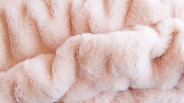 Is Minky or Fleece Better? Comparing the Softest Blanket Materials on the Market