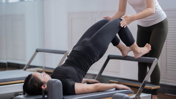 Private vs Group Pilates: NYC Studio Compares Costs & Benefits